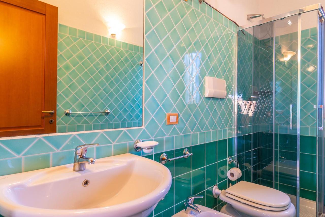 Il Faro San Teodoro Aparthotel ภายนอก รูปภาพ